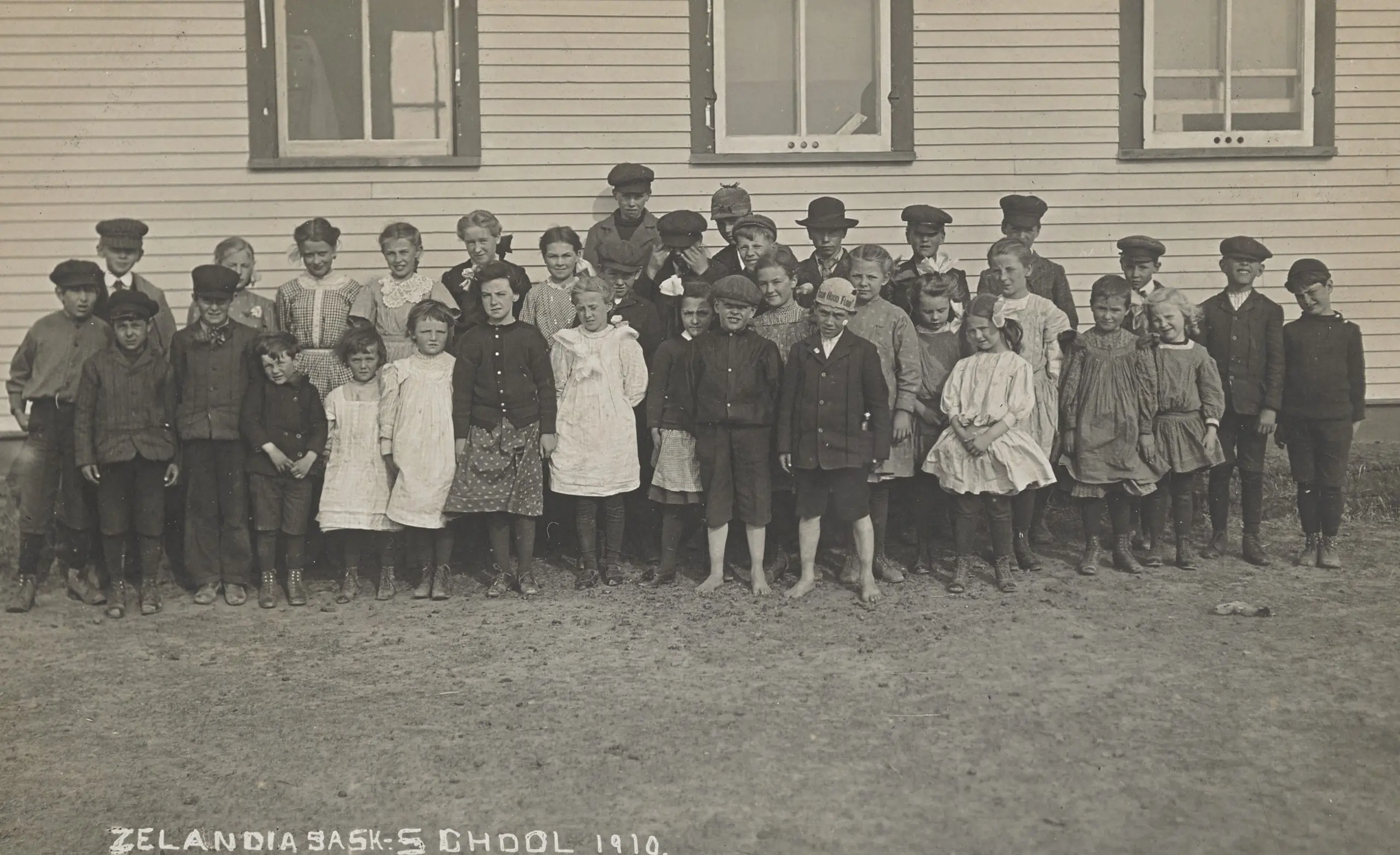 Schoolchildren outside Zealandia school